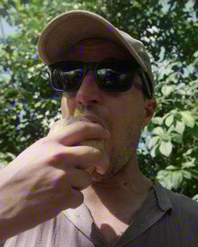 José Visconti, founder of Cacao Adventures, in a cacao field in Peru